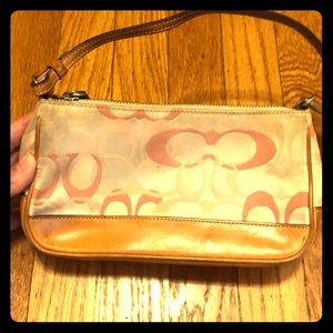Small pink and cream coach bag